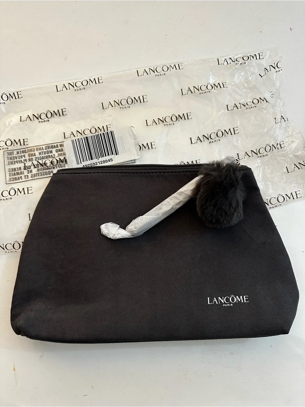 Lancôme Gray Cosmetic Pouch/Wristlet with Pom Pom Zipper